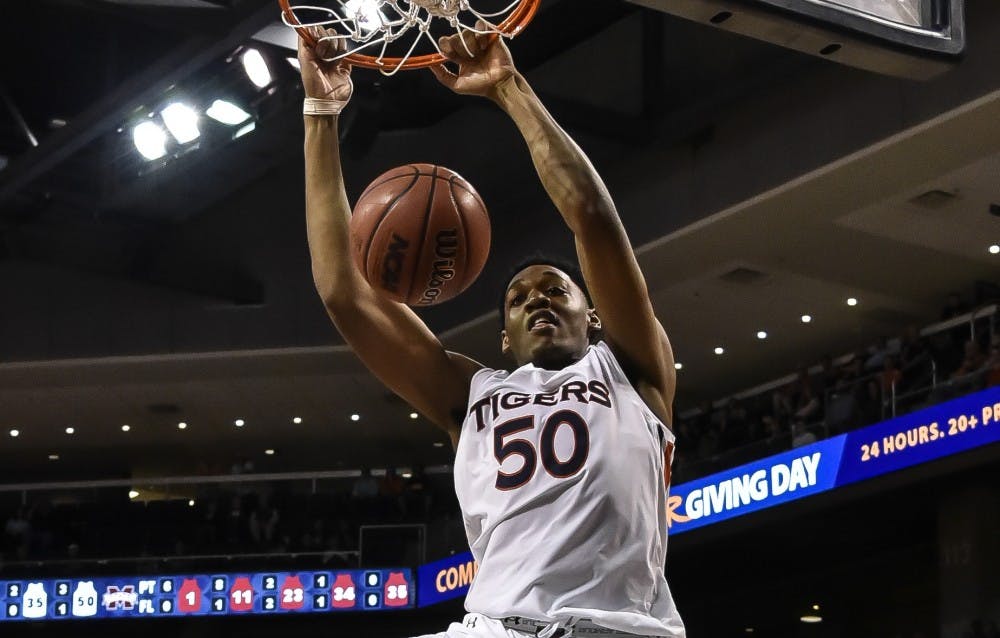 Auburn Tigers center Austin Wiley (50) dunks the ball during the first half of the Auburn vs Mississippi State basketball on Tuesday, Feb. 7, 2017, in Auburn, Ala.