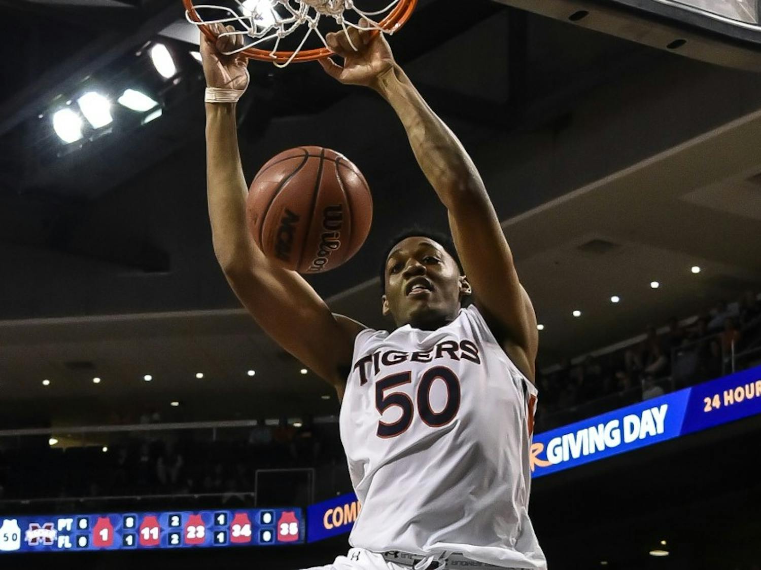 Auburn Tigers center Austin Wiley (50) dunks the ball during the first half of the Auburn vs Mississippi State basketball on Tuesday, Feb. 7, 2017, in Auburn, Ala.