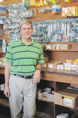 Dozier Smith T in his hardware store, which has been owned by his family for three generations in downtown Opelika. (Christen Harned / Photo Editor)