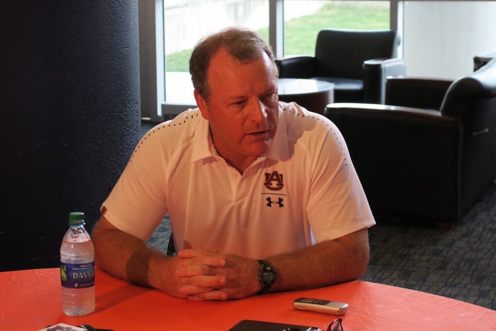 <p>Auburn running backs coach Tim Horton being interviewed on August 16, 2018, in Auburn, Ala.</p>