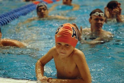 Sullivan Britnell, a  7-year-old cystic fibrosis patient, swam 50 meters in the Laps for Cystic Fibrosis event in Auburn Saturday. JD Schein / Photo Editor