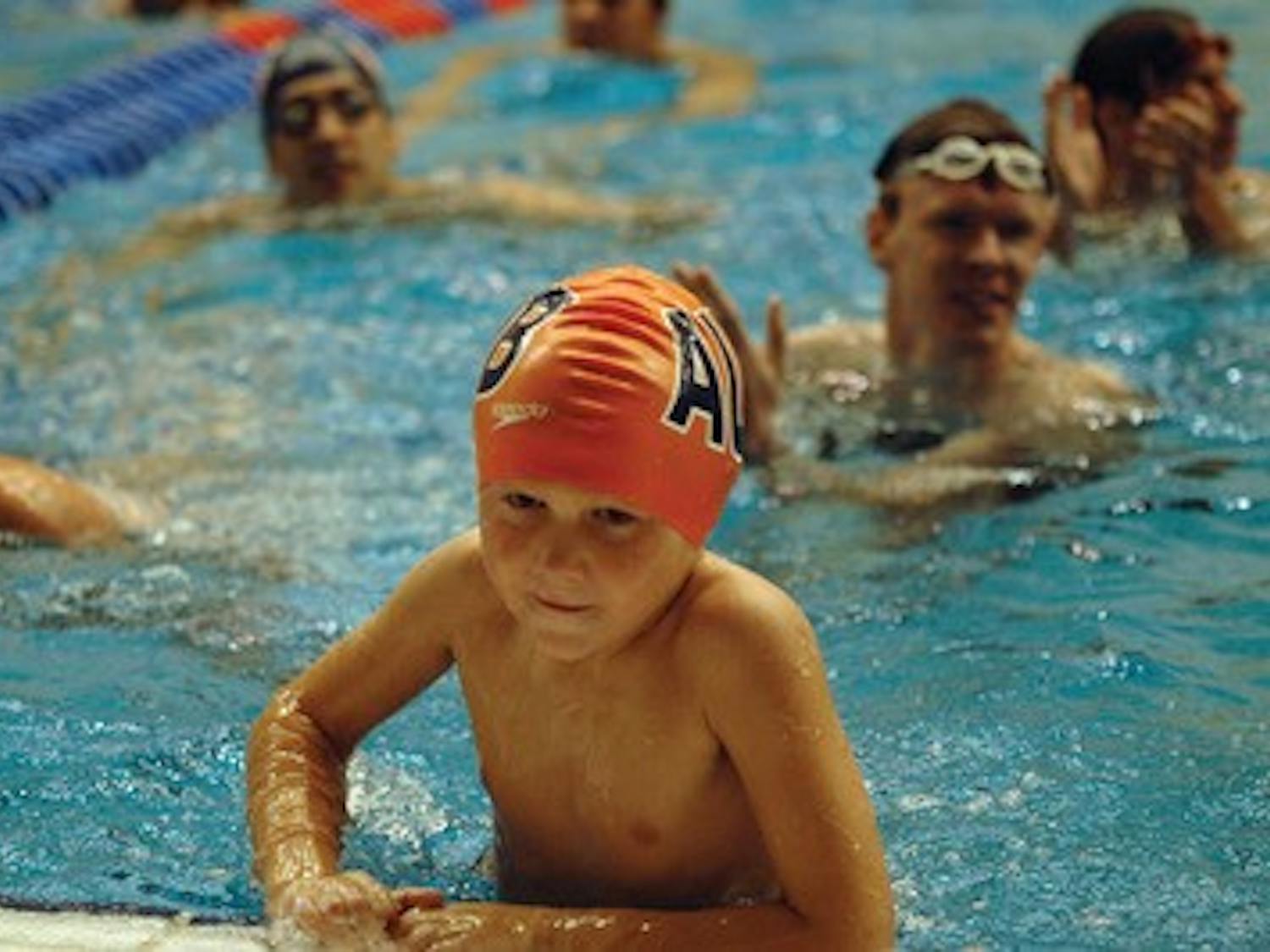 Sullivan Britnell, a 7-year-old cystic fibrosis patient, swam 50 meters in the Laps for Cystic Fibrosis event in Auburn Saturday. JD Schein / Photo Editor