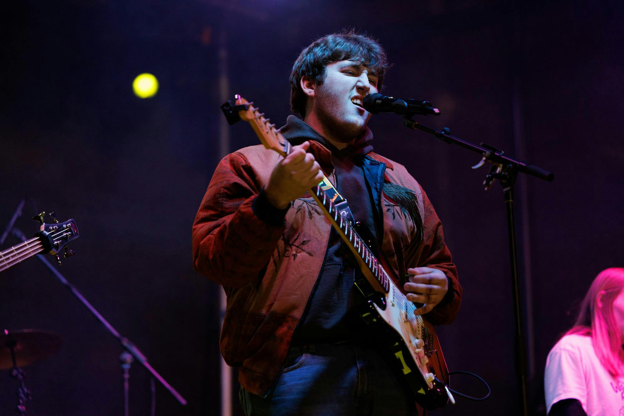 Bennett Hylton plays guitar and sings for Weary Pursuit during the War Damn Coffee Jam held on Samford lawn on Nov. 11, 2025.
