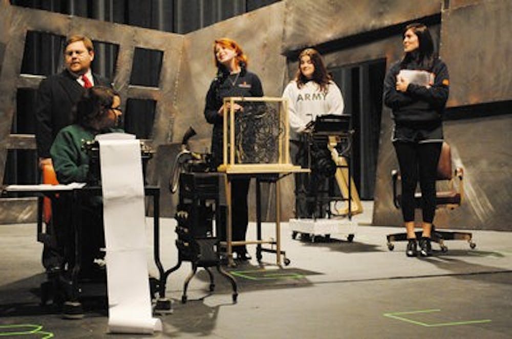 Cast members rehearse for Auburn University Theatre's upcoming production of the American expressionist play "Machinal." (Elaine Busby / ASSISTANT PHOTO EDITOR)