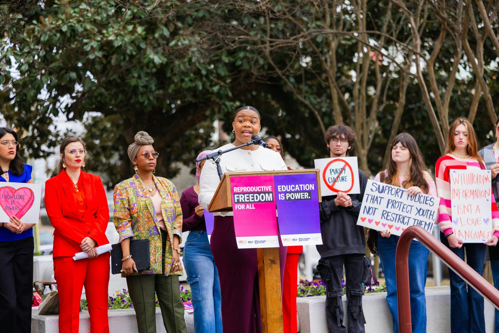 Justala Dean, communications strategist at the ACLU of Alabama, speaks as the MC of the Our Bodies, Our Futures Advocacy Day on Feb. 10, 2026.