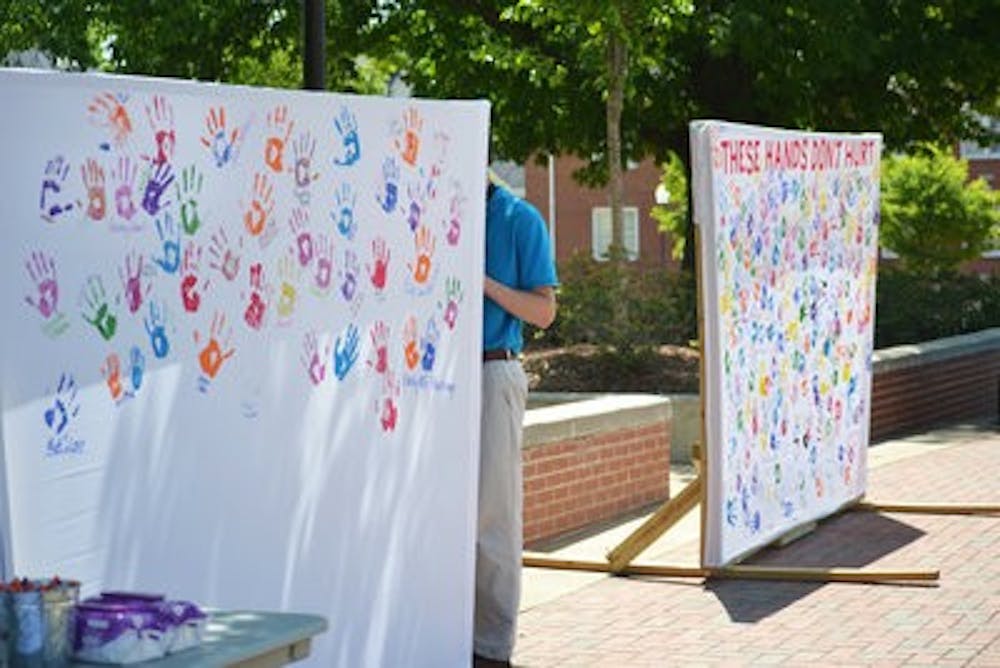 "These Hands Don't Hurt" is a campaign promoting Sexual Assault Awareness Month that took place on the Concourse this week. (Danielle Lowe / ASSISTANT PHOTO EDITOR)