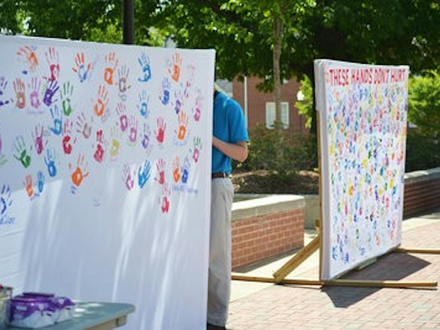 "These Hands Don't Hurt" is a campaign promoting Sexual Assault Awareness Month that took place on the Concourse this week. (Danielle Lowe / ASSISTANT PHOTO EDITOR)
