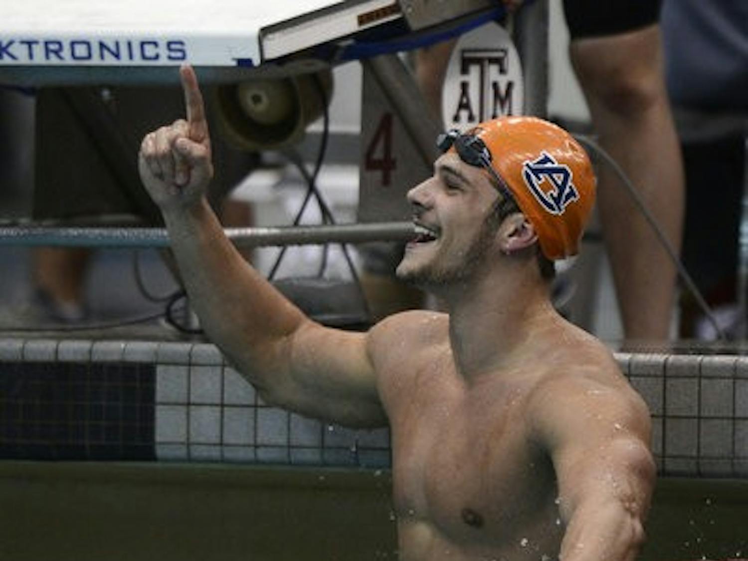 Auburn's Marcelo Chierighini celebrates winning the SEC Championship in the 50-yard freestyle Wednesday, Feb. 20. (Courtesy of Todd Van Emst)