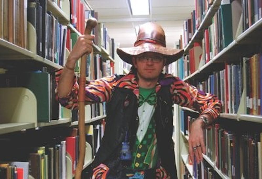 "The Wizard" Rodney Hall poses in the RBD Library.