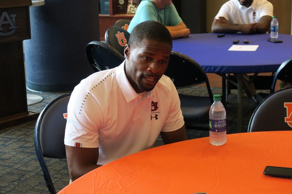 Assistant Football Coach Travis Williams being interviewed on  August 16, 2018.