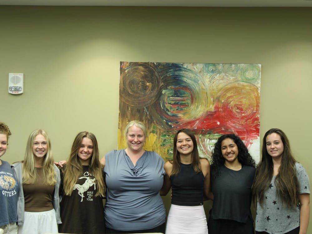 Dr. Sara Blaine PhD (Center) and her research students Madeline Windsor, Emily Beatty, Abigail Starace, Ryan Yancey, Sumedha Tandon, and Isabelle Hothmann (Left to Right) at the MRI Research Center in Auburn, AL Monday, Sep. 15, 2025 (Photo/ Wyatt Loftin)