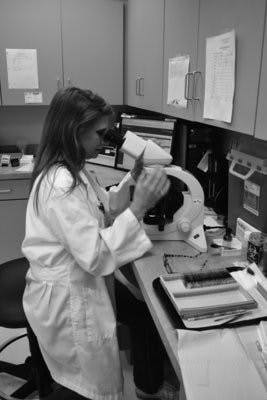 Aimee Sacks, lab technician at the Auburn Medical Clinic, works to determine illnesses, allergeries and diseases from blood and other samples from patients. (Danielle Lowe / ASSISTANT PHOTO EDITOR)