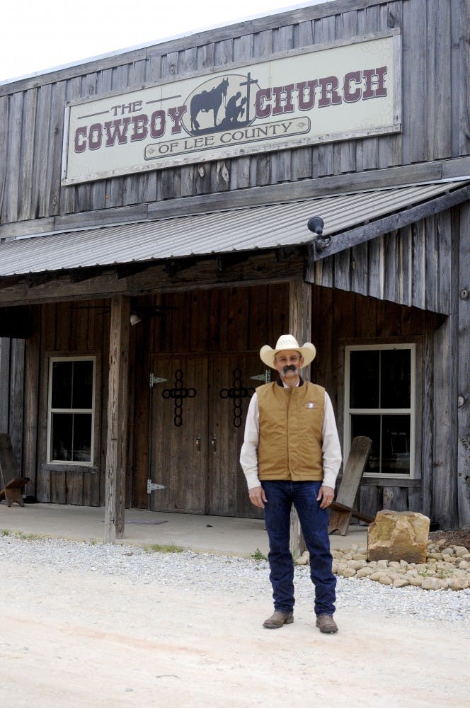 Head pastor Jim Strickland stands in front of the Cowboy Church on April 22, in Waverly, Ala.&nbsp;