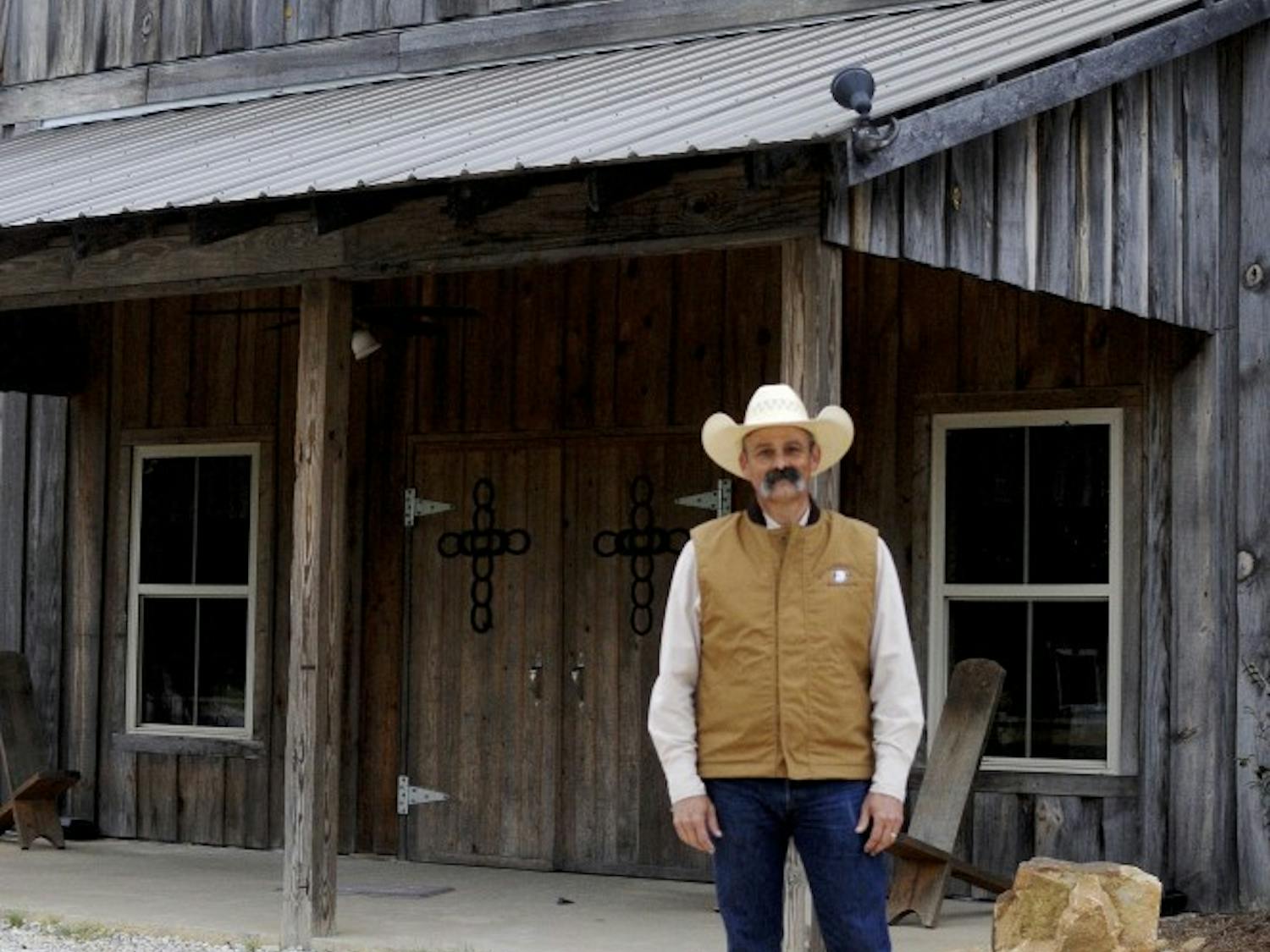 Head pastor Jim Strickland stands in front of the Cowboy Church on April 22, in Waverly, Ala.&nbsp;