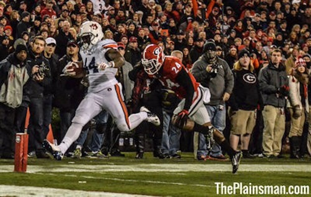 Cameron Artis-Payne going in for a touchdown. (Raye May | Photo Editor)