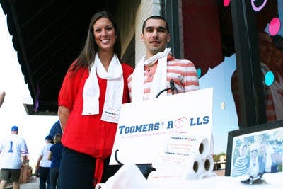 Jen Buckert and Clement Mardon display their scarves at a trunk show at Wrapsody Saturday. (Rebecca Croomes / ASSISTANT PHOTO EDITOR)