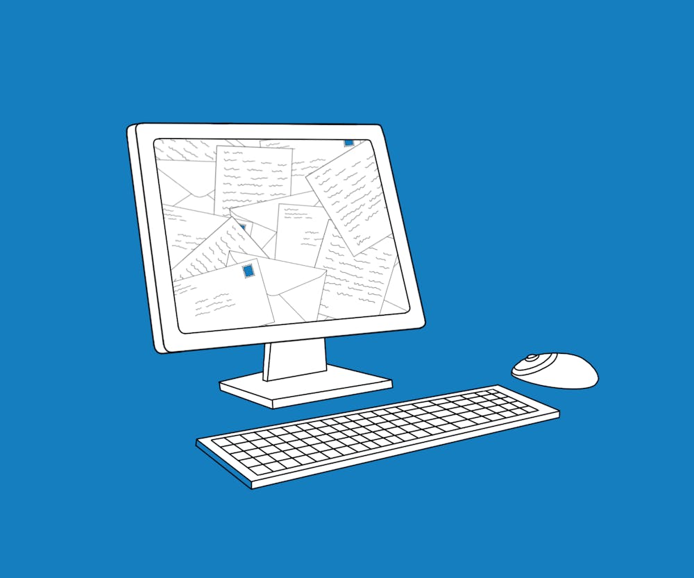 A computer monitor filled with letters and envelopes, with a computer mouse and keyboard on a blue background.