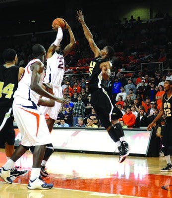 Sophomore forward Allen Payne shoots over an Arkansas-Pine Bluff defender Monday in the Tigers' 72-59 victory. (Christen Harned / ASSISTANT PHOTO EDITOR)