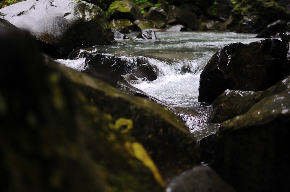 Water cascades over small rocks at the base of La Fortuna waterfall on Friday, July 21, 2017 in La Fortuna, Costa Rica.&nbsp;