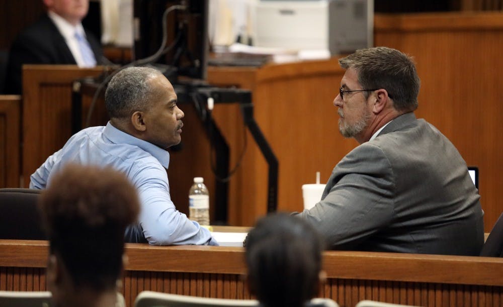 Defendant Tony Patillo, left, speaks with his attorney, Jon Taylor, right, on Thursday, Feb. 28, 2019, during the second day of the Tiger Transit rape trial at the Lee County Justice Center in Opelika.