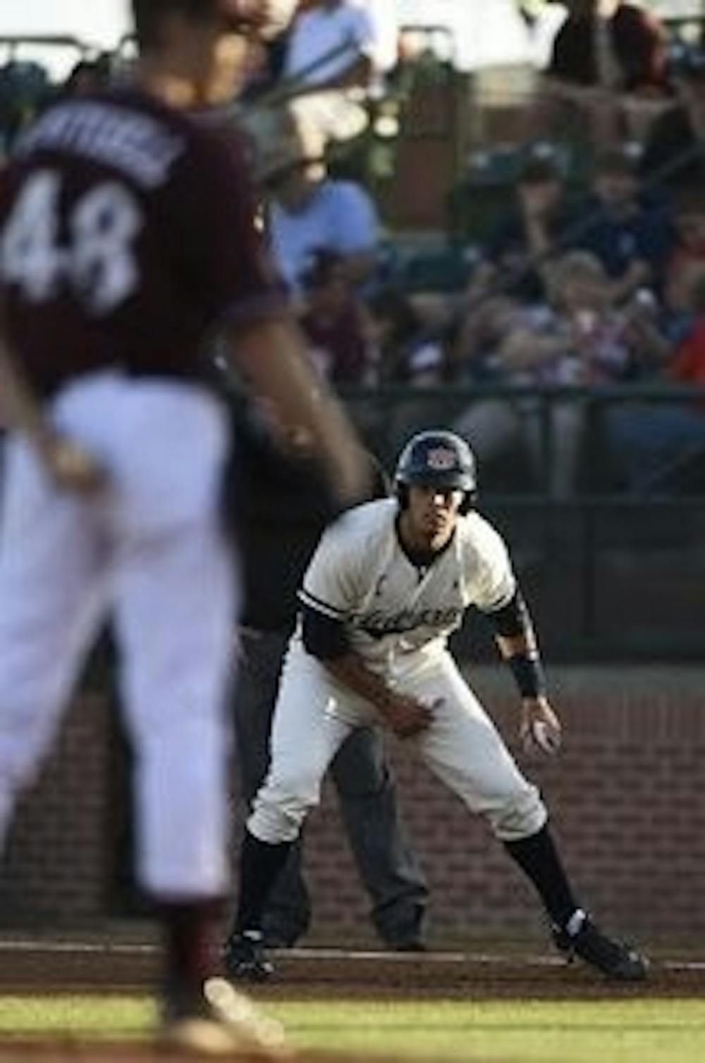 Damek Tomscha (25) watches the pitcher from first. Mississippi State vs Auburn in Auburn, Ala. on Saturday, May 3, 2014. (Zach Bland / Auburn Athletics)