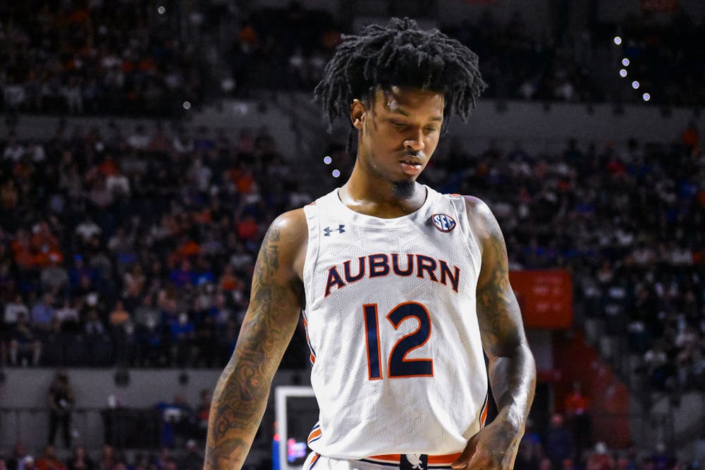 February 19, 2022; Gainesville, Florida; Zep Jasper (12) trots back to the paint during a match between Auburn and Florida in the Stephen C. O'Connell Center.