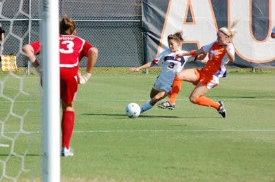 Jessica Rightmer, sophomore midfielder/forward, attempts a shot against Florida Sunday. (Charlie Timberlake / Assistant Photo Editor)