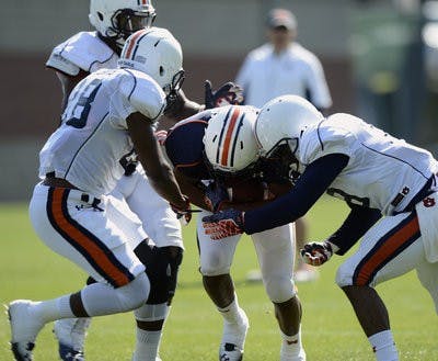T.J. Davis (left), Ricardo Louis (center) and Ryan White (right). (Courtesy of Todd Van Emst / AUBURN ATHLETICS PHOTOGRAPHER)