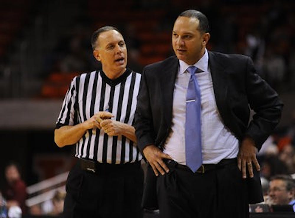 Former Auburn basketball head coach Tony Barbee argues with a referee against South Carolina. (Contributed by Zach Bland)