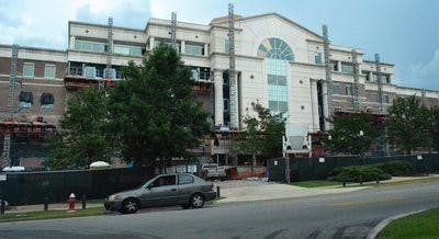 The Lowder Business building is receiving new exterior brick to match surrounding buildings on campus, as well as new windows to fix issues with water leakage. (Danielle Lowe / PHOTO EDITOR)
