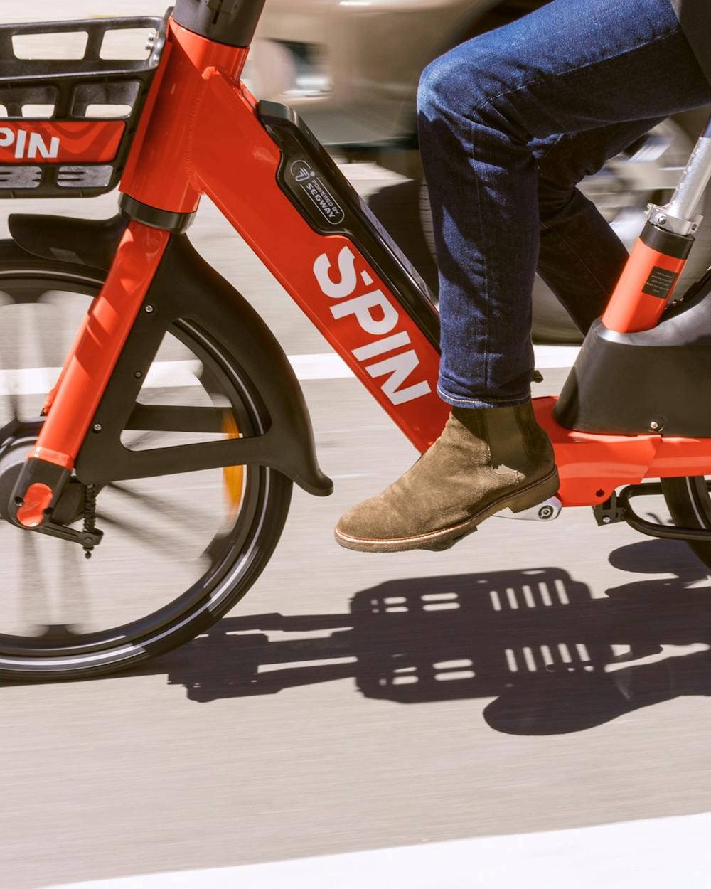 A person rides a spin e-bike. Photo via Flickr.