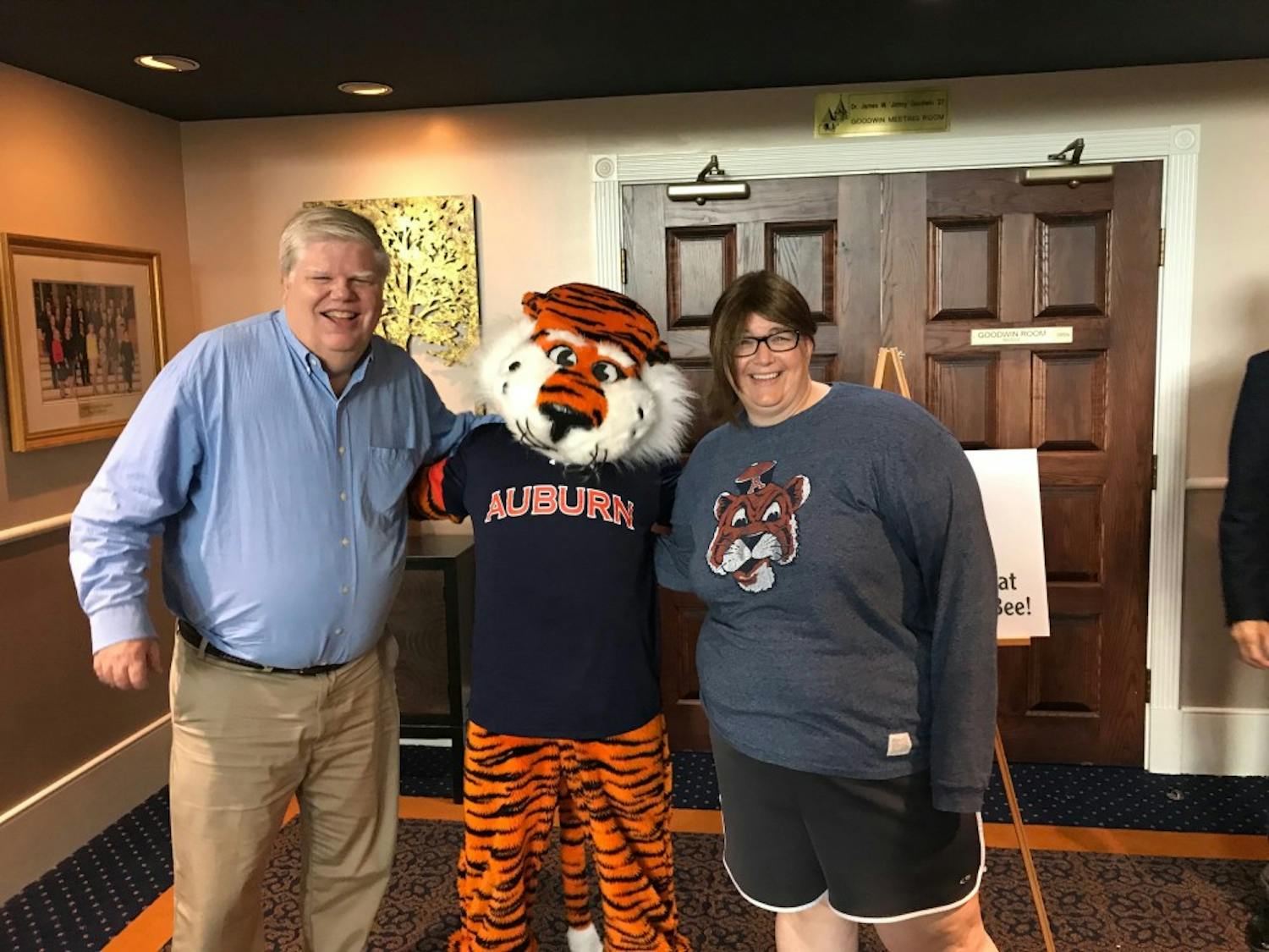 The winners of the 2018&nbsp;Great Grown-Up Spelling Bee smile with Aubie after their success.&nbsp;