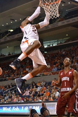 Senior forward Kenny Gabriel throws down a dunk against the Gamecocks Saturday. The Tigers defeated South Carolina 63-52 at home. (Danielle Lowe / ASSISTANT PHOTO EDITOR)