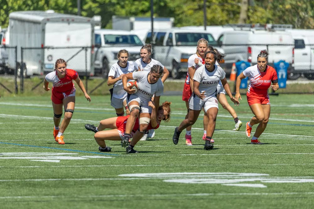Brown Rugby team playing against Sacred Heart