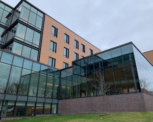 Photo of a modern building with many large windows.