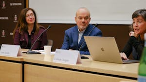 Panelists Susan Moffitt, Larry Jacobs, and Colleen Grogan speak at the Festschrift event.