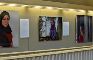 Three photographs side by side. The furthest right shows a boy with the side of his face against a wood pole. The center shows a woman looking straight wearing a purple dress and maroon head covering. The furthest left shows a woman smiling at the camera wearing a red dress and a black head covering.