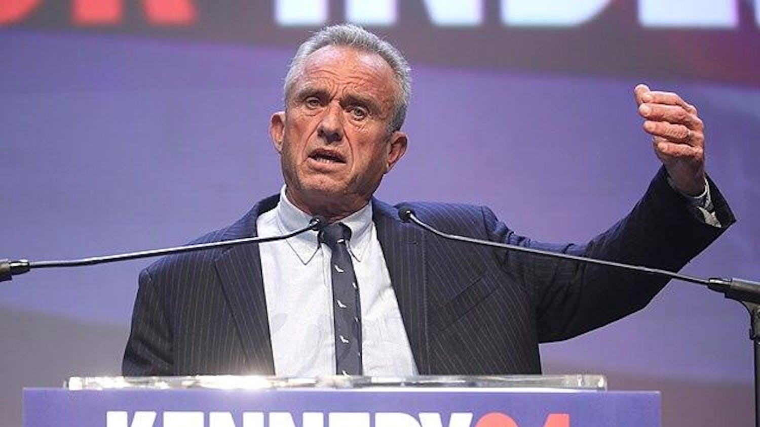 Photo of RFK Jr. at a podium delivering a speech.