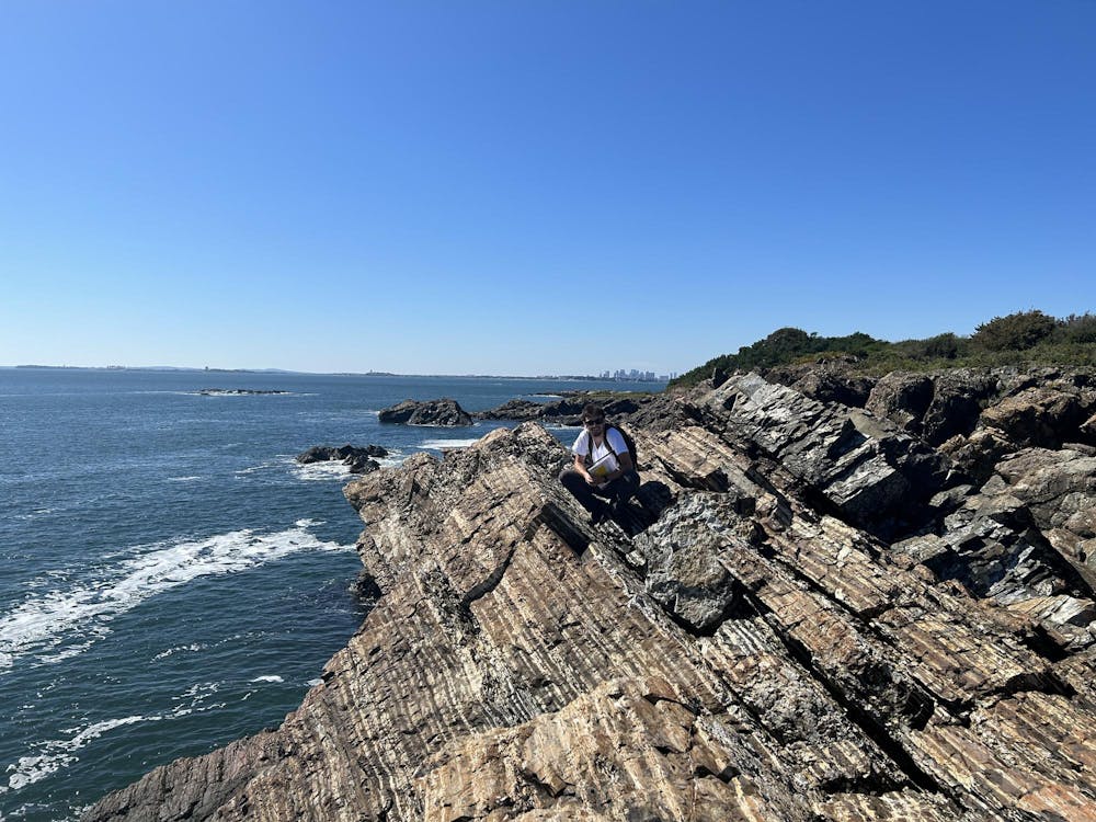 <p>Department of Earth, Environmental and Planetary Sciences undergraduate Gabriel Traietti &#x27;25 poses on rocky cliffs at Lodge Park, in Nahant, Mass., on September 17. </p><p>Courtesy of Kaiyuan Wang </p>