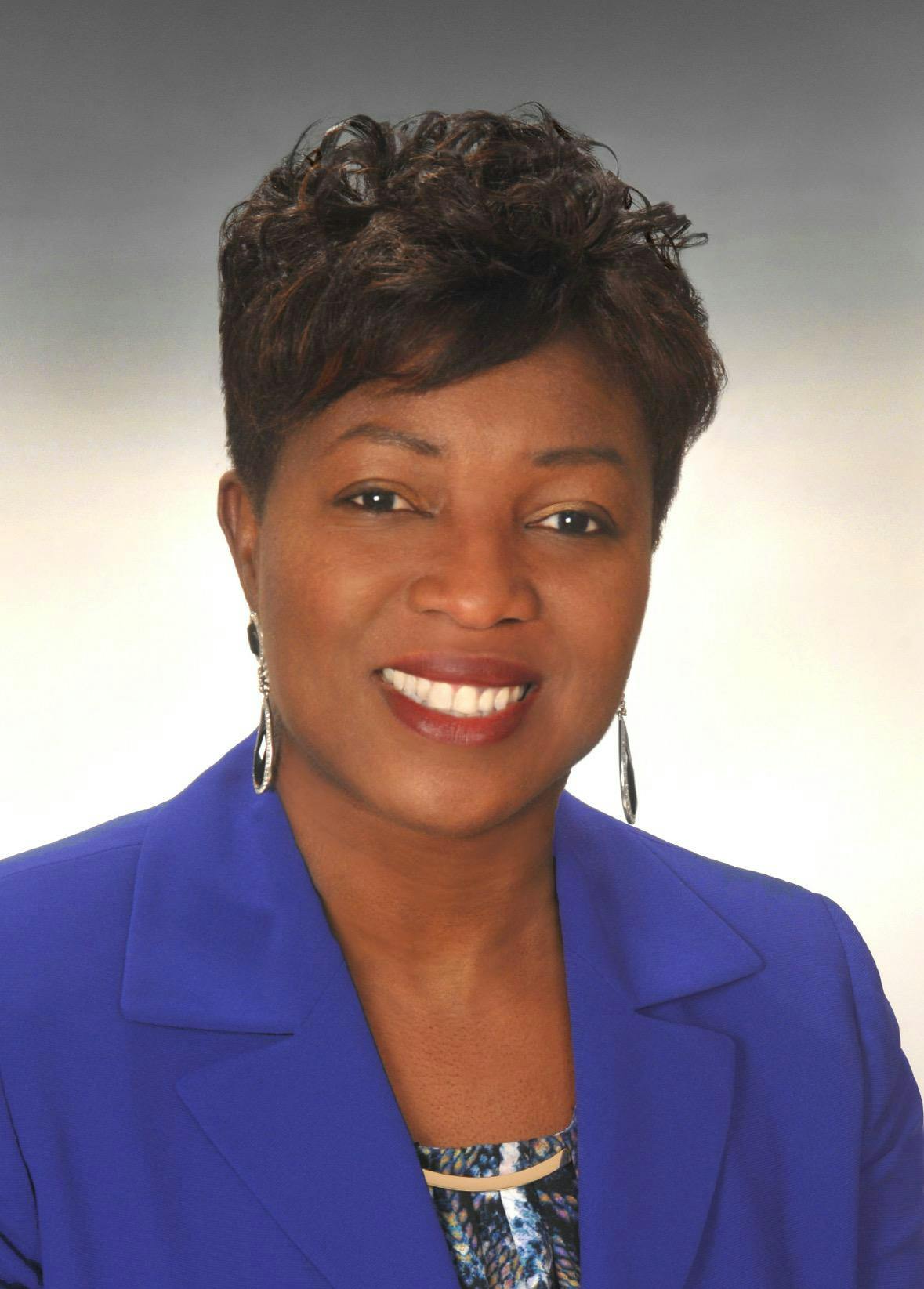 A picture of the CEO of the RI Black Business Association. 