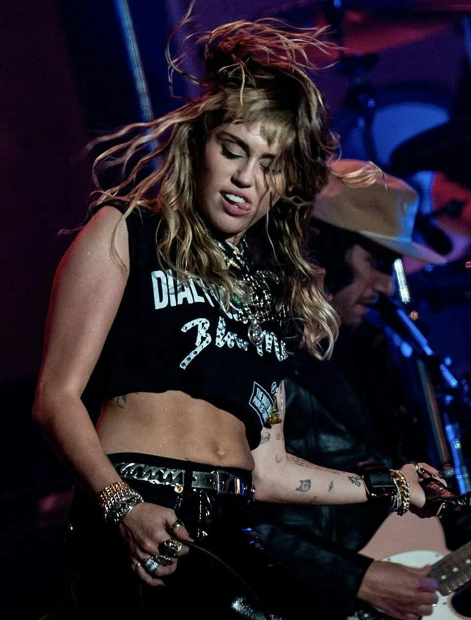 A photo of Miley Cyrus performing at a concert. Courtesy of Raph_PH via Wikimedia Commons