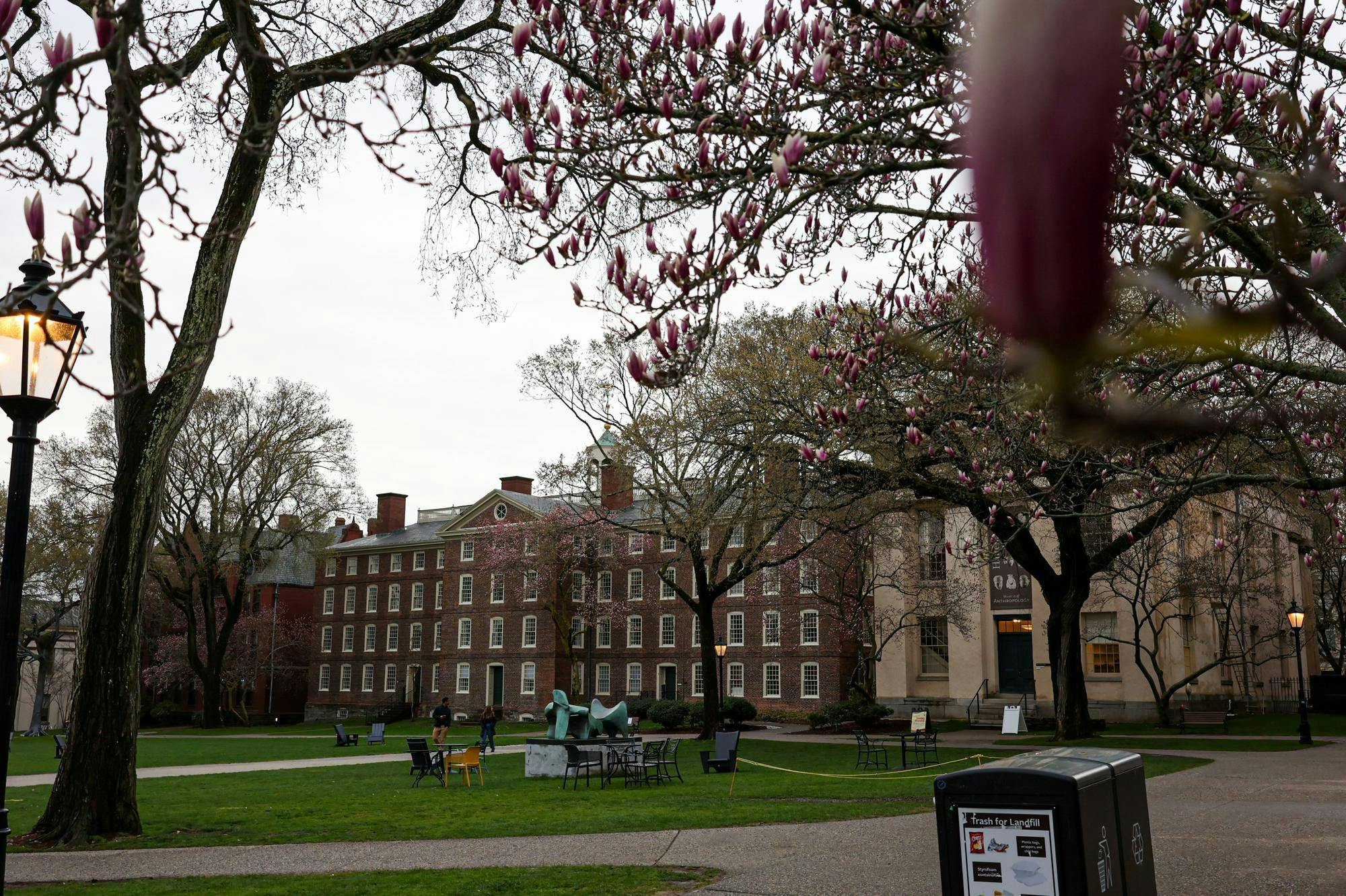 Photo of Brown’s campus with a large brick building in the center and green lawn in front.


