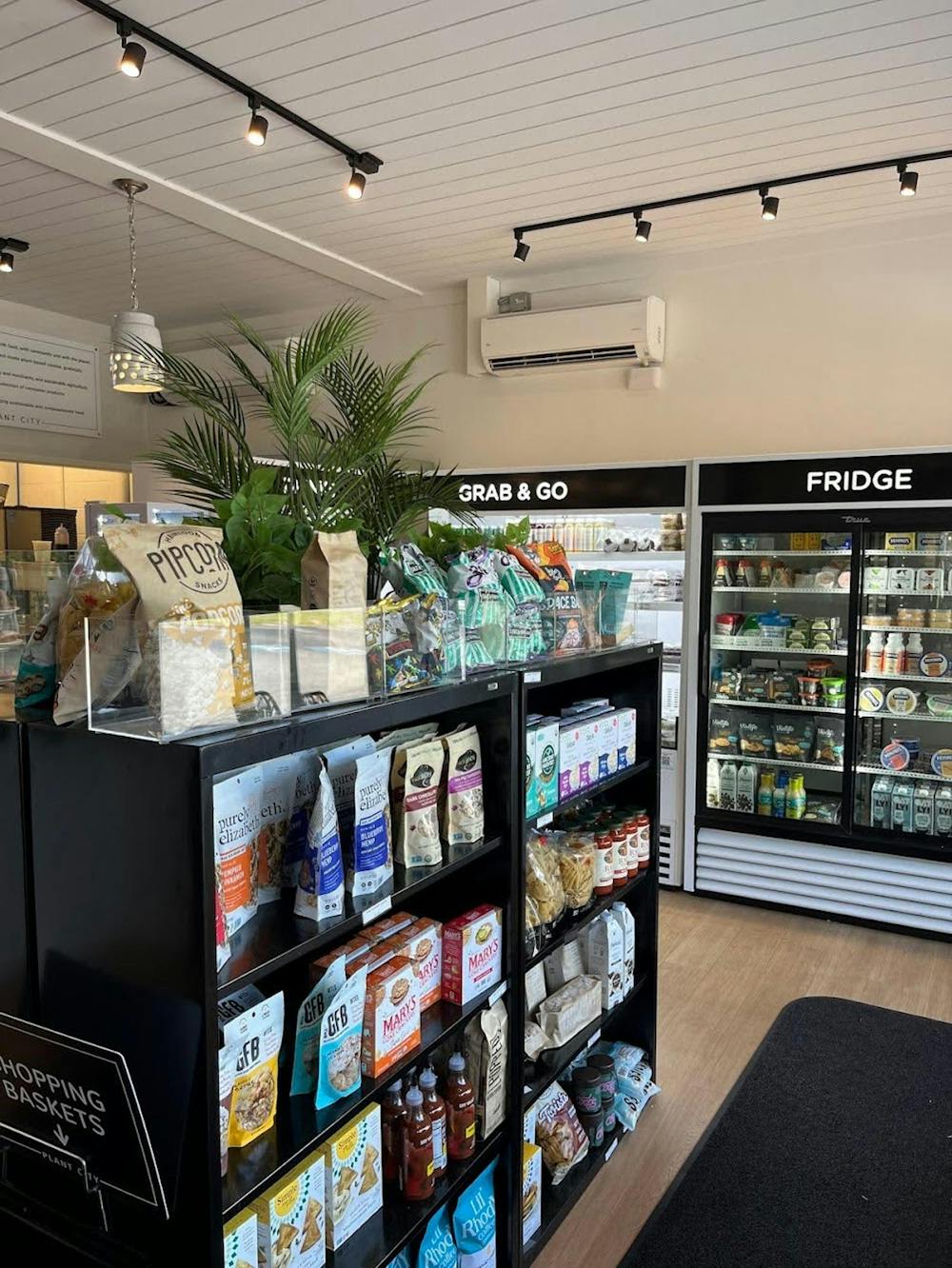 Plant-based snacks, grab-and-go meals and refrigerated goodies line the shelves of Plant City’s Barrington location, located right next to the East Bay Bike path.