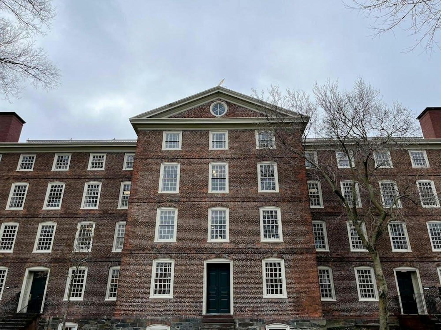 A photo of University Hall on Brown's campus on a cloudy day.