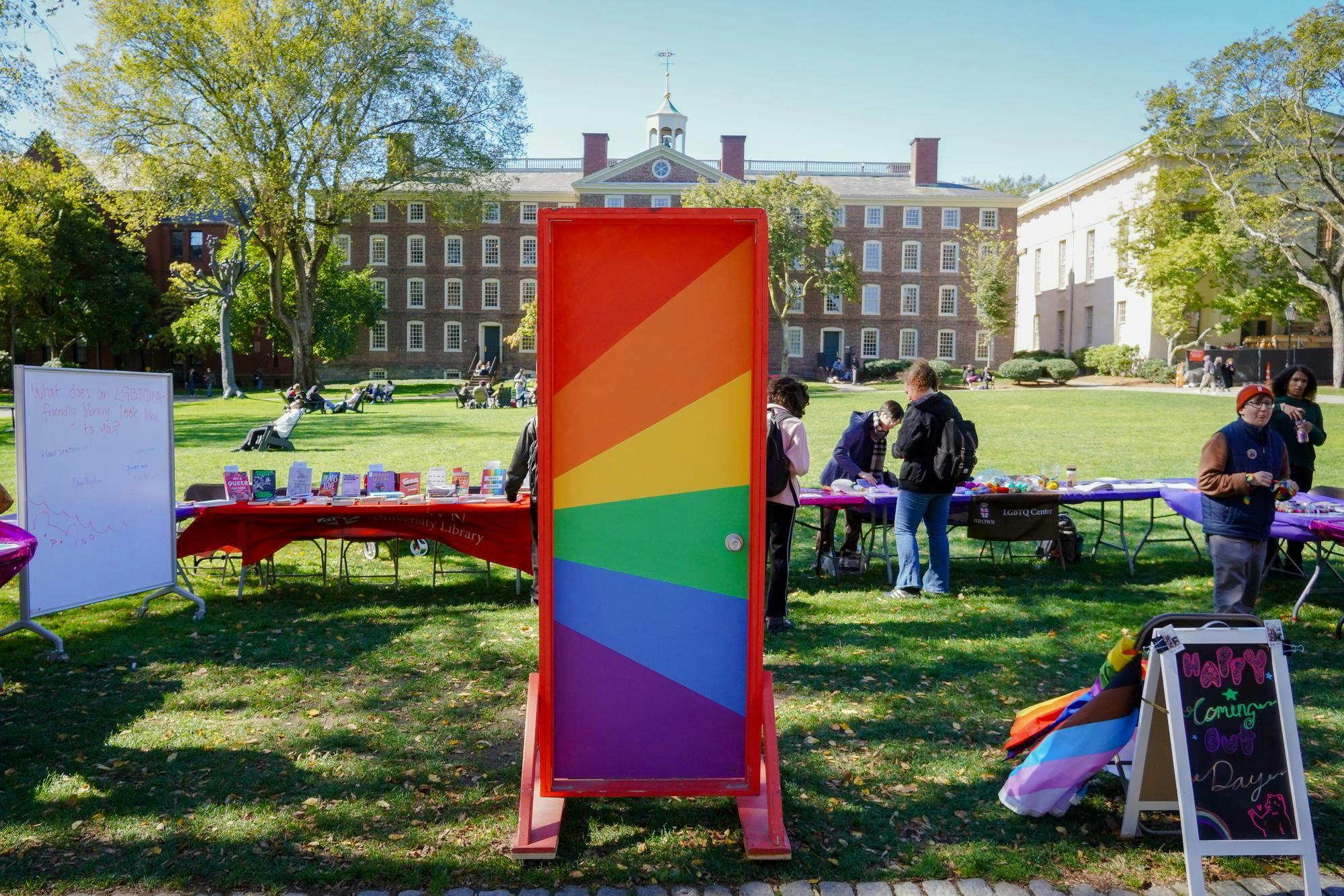 Photo of a door painted in rainbow stripes on the Main Green.