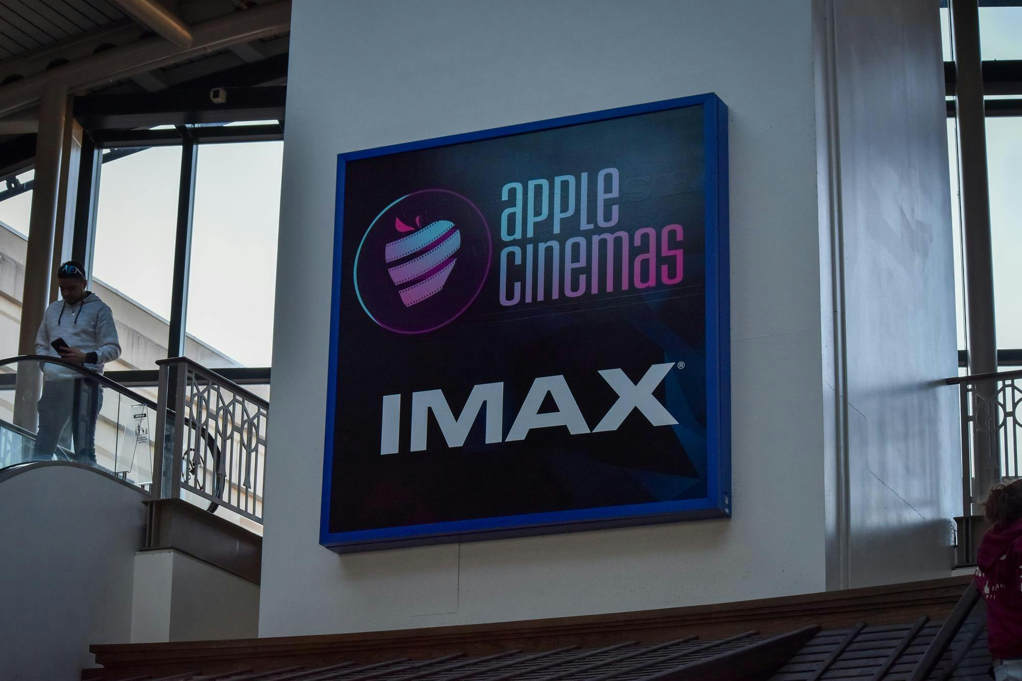 Photo of the new Apple Cinemas sign in Providence Place mall.