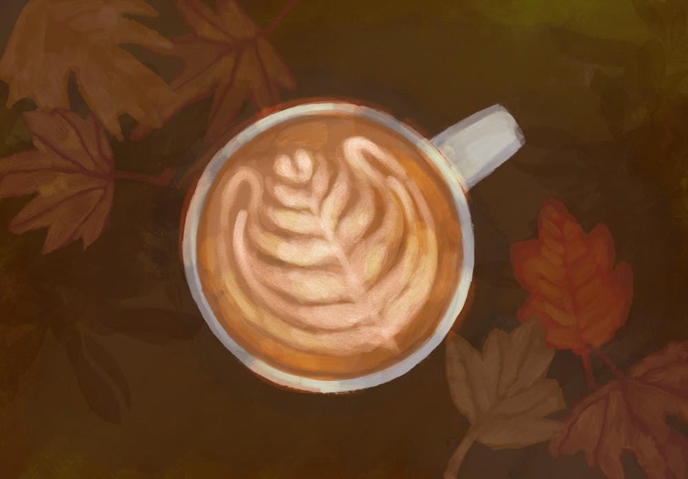 An illustration of a latte on a background of brown leaves. 