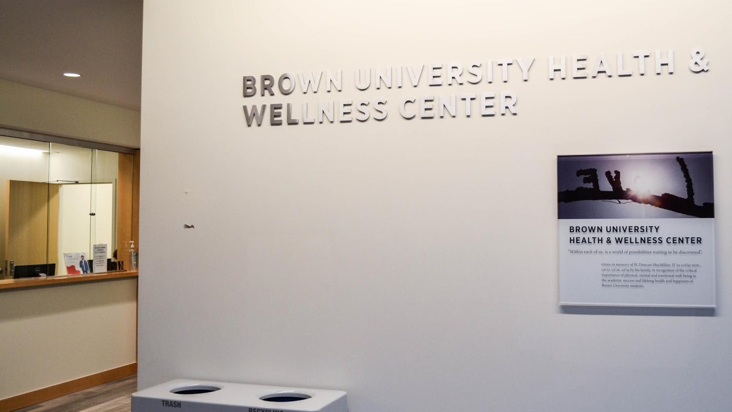 A photo shows the sign of the Student Health and Wellness Center.