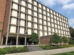 Photo of outside of Barus and Holley building on a sunny day. 
