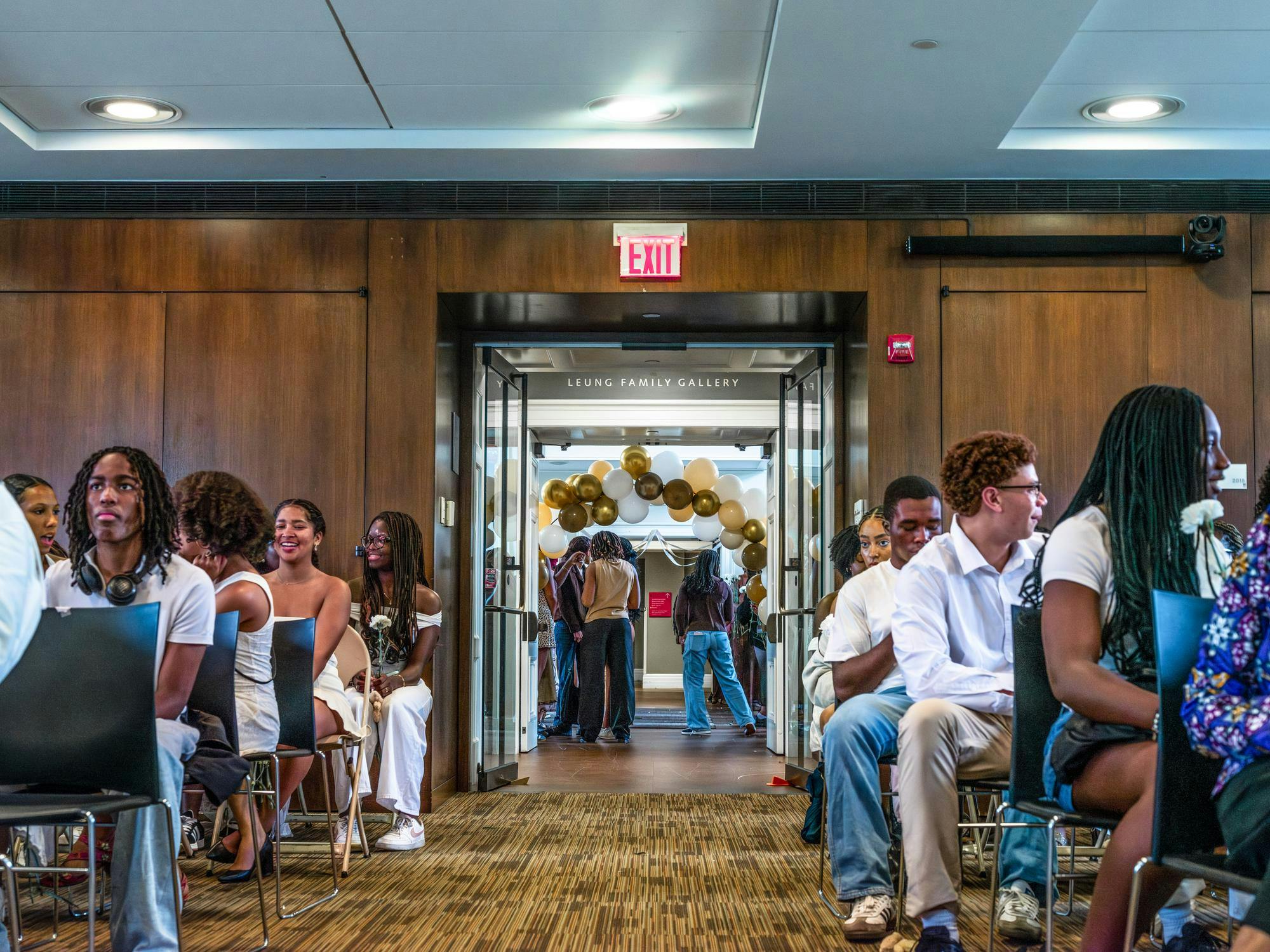 A photo of first-year students meeting for the Black Student Union's 8th annual Black Convocation.